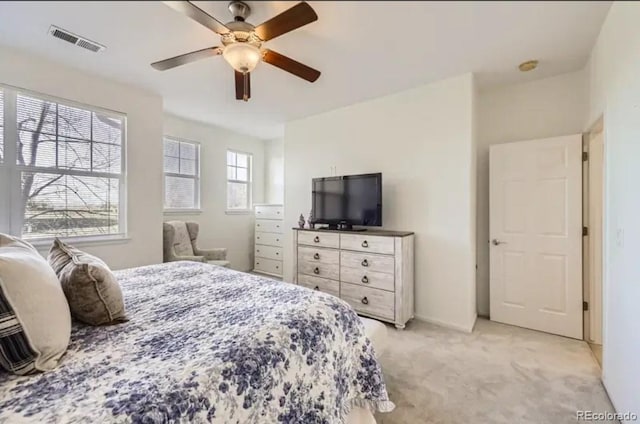 8915 Federal Blvd Unit 203, Westminster, CO 80260 - bedroom with light colored carpet and a ceiling fan
