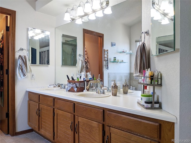 5695 W 109th Cir, Westminster, CO 80020 - bathroom featuring double vanity and tile patterned flooring