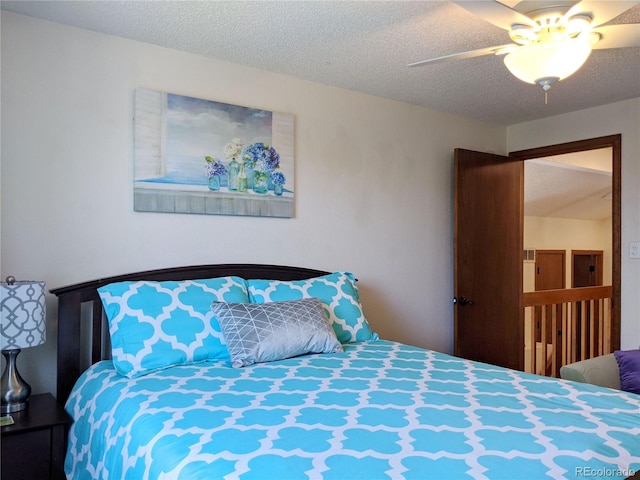 5695 W 109th Cir, Westminster, CO 80020 - bedroom with ceiling fan and a textured ceiling