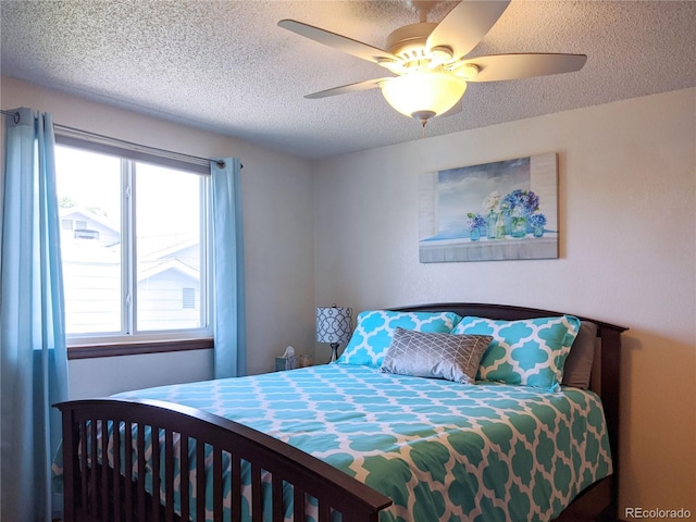 5695 W 109th Cir, Westminster, CO 80020 - bedroom featuring a textured ceiling and a ceiling fan