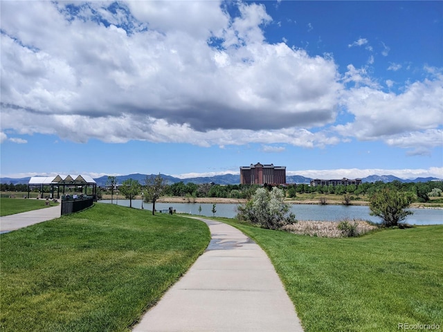 5695 W 109th Cir, Westminster, CO 80020 - view of home's community featuring a water and mountain view and a lawn