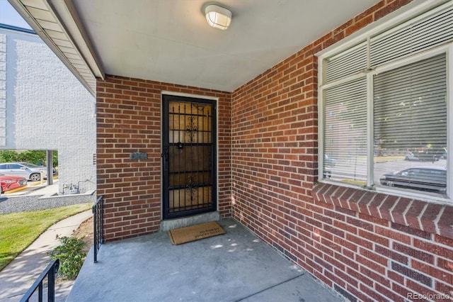 2431 S York St, Denver, CO 80210 - property entrance with brick siding