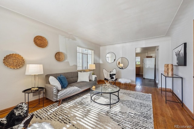 2431 S York St, Denver, CO 80210 - living area with wood finished floors and baseboards