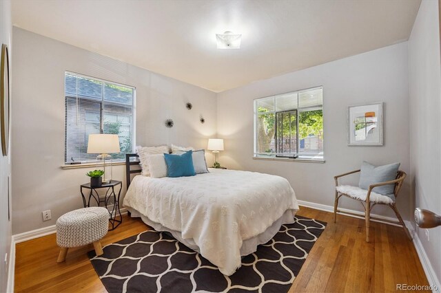 2431 S York St, Denver, CO 80210 - bedroom with wood finished floors