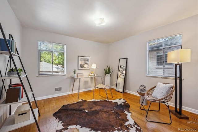 2431 S York St, Denver, CO 80210 - office area with wood finished floors and baseboards