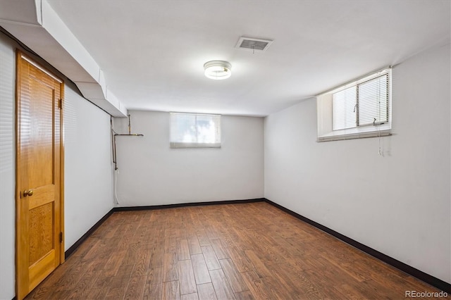 2431 S York St, Denver, CO 80210 - basement with plenty of natural light and dark wood-type flooring