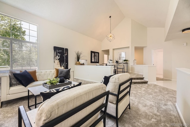 5016 S Nelson St Unit C, Littleton, CO 80127 - carpeted living room with high vaulted ceiling and baseboards