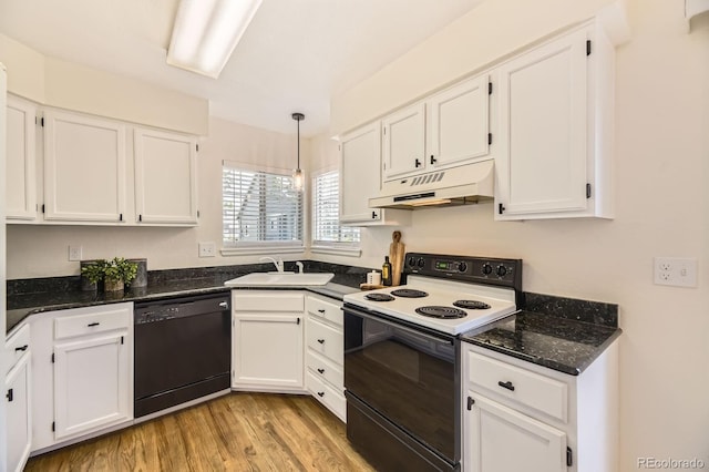 5016 S Nelson St Unit C, Littleton, CO 80127 - kitchen with under cabinet range hood, dishwasher, range with electric cooktop, a sink, and white cabinetry