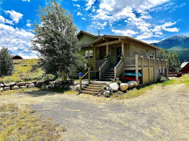 view of front of house with a mountain view