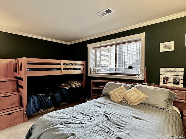 carpeted bedroom with crown molding