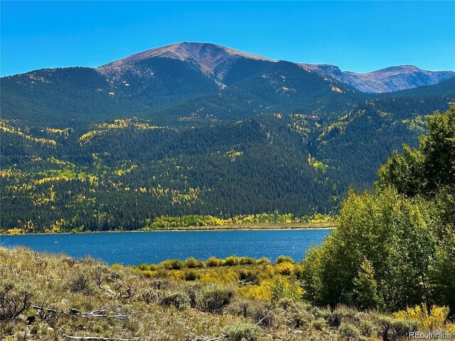 mountain view featuring a water view