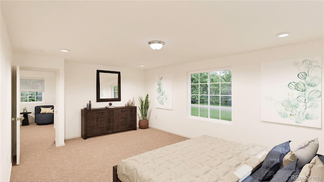 bedroom featuring light colored carpet