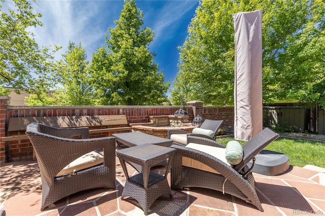 view of patio / terrace with outdoor lounge area and a fenced backyard