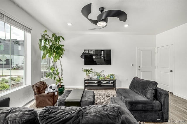 1500 Sun Way, Lafayette, CO 80026 - living area with wood finished floors, baseboards, and recessed lighting