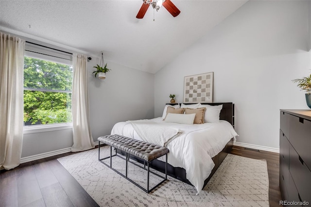 3889 S Fraser St, Aurora, CO 80014 - bedroom with lofted ceiling, baseboards, wood finished floors, and ceiling fan