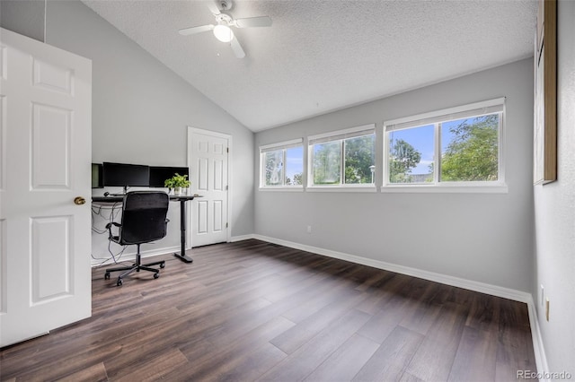 3889 S Fraser St, Aurora, CO 80014 - office featuring dark wood-type flooring, ceiling fan, a textured ceiling, and vaulted ceiling