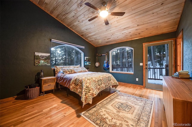 46 Apache Rd, Evergreen, CO 80439 - bedroom featuring access to outside, a ceiling fan, vaulted ceiling, wood ceiling, and wood finished floors