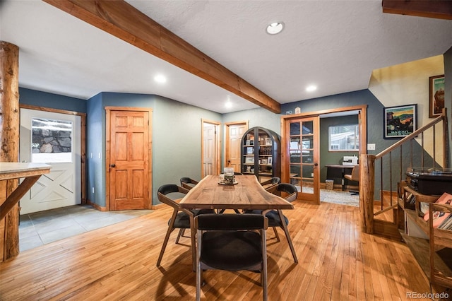 46 Apache Rd, Evergreen, CO 80439 - dining area with recessed lighting, stairway, french doors, light wood-style floors, and beam ceiling