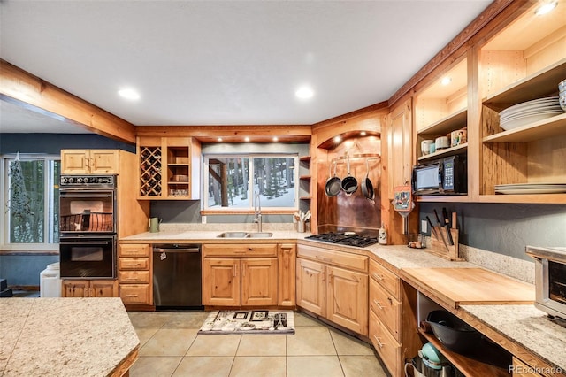 46 Apache Rd, Evergreen, CO 80439 - kitchen with light countertops, a sink, black appliances, and open shelves