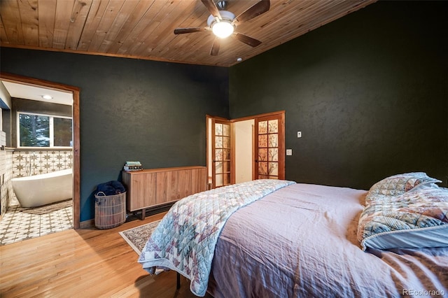 46 Apache Rd, Evergreen, CO 80439 - bedroom featuring lofted ceiling, wooden ceiling, a ceiling fan, and wood finished floors