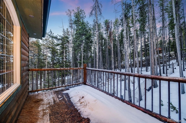 46 Apache Rd, Evergreen, CO 80439 - view of snow covered back of property