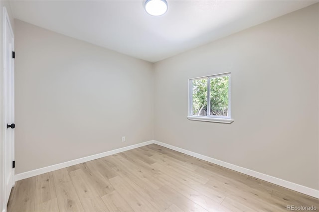 1750 S Zuni St, Denver, CO 80223 - unfurnished room featuring light wood-style floors and baseboards