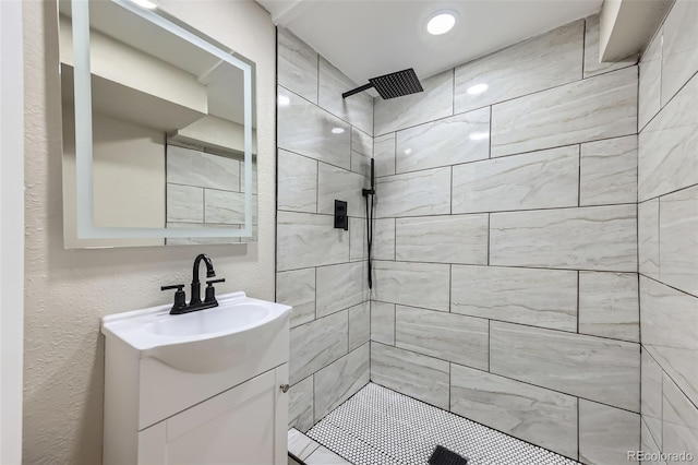1750 S Zuni St, Denver, CO 80223 - full bath with a tile shower and vanity