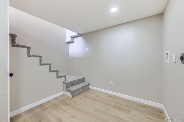 1750 S Zuni St, Denver, CO 80223 - staircase with wood finished floors and recessed lighting