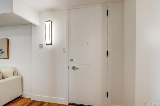 1250 N Humboldt St Unit 202, Denver, CO 80218 - entrance foyer with light wood-type flooring and baseboards