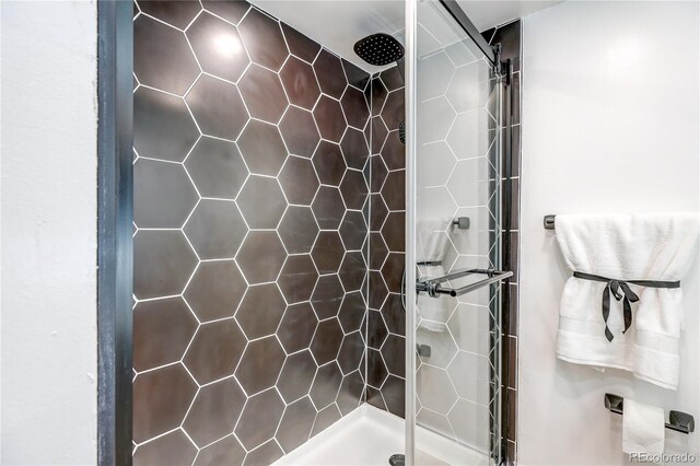 1250 N Humboldt St Unit 202, Denver, CO 80218 - bathroom with tiled shower