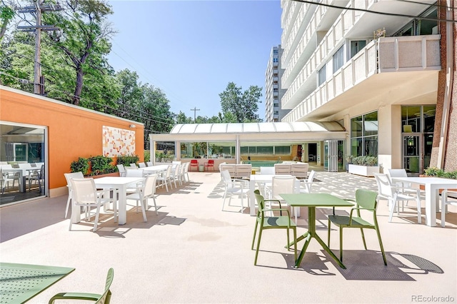 1250 N Humboldt St Unit 202, Denver, CO 80218 - view of patio with outdoor dining space and an outdoor hangout area