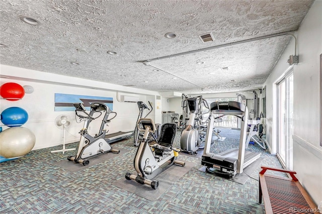 1250 N Humboldt St Unit 202, Denver, CO 80218 - gym featuring a wall mounted air conditioner and carpet flooring