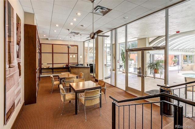 1250 N Humboldt St Unit 202, Denver, CO 80218 - common area with floor to ceiling windows and recessed lighting
