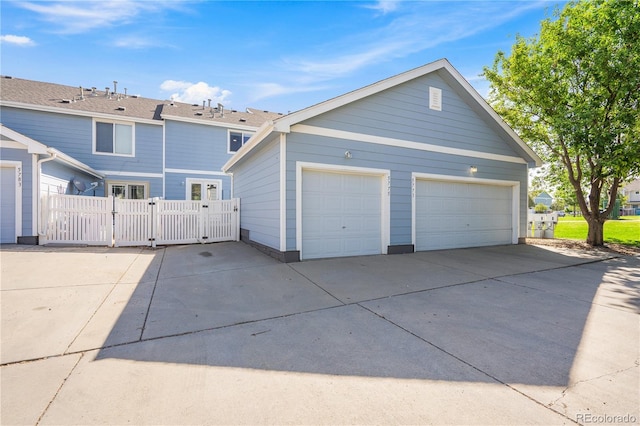 view of side of property featuring a garage