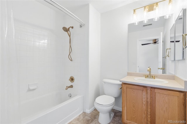 full bathroom with tile patterned flooring, vanity, toilet, and shower / bath combo with shower curtain