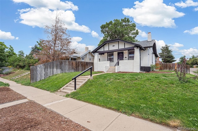 2800 N Fillmore St, Denver, CO 80205 - bungalow featuring brick siding and a chimney