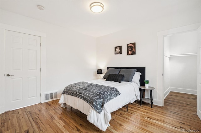 2800 N Fillmore St, Denver, CO 80205 - bedroom featuring wood finished floors