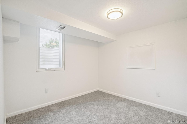 2800 N Fillmore St, Denver, CO 80205 - below grade area featuring carpet and baseboards