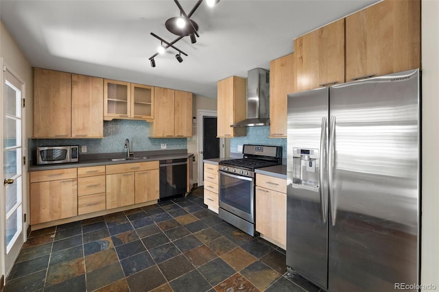 2672 S Magnolia St, Denver, CO 80224 - kitchen featuring stainless steel appliances, wall chimney range hood, dark countertops, and backsplash