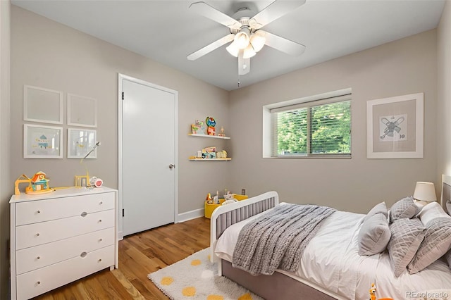 2672 S Magnolia St, Denver, CO 80224 - bedroom with light wood-style flooring and ceiling fan