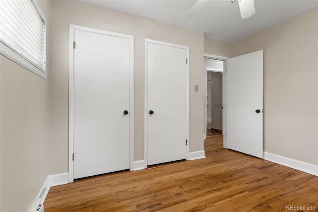2672 S Magnolia St, Denver, CO 80224 - unfurnished bedroom with light wood-style floors and a ceiling fan