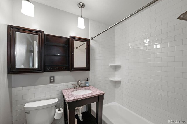 2672 S Magnolia St, Denver, CO 80224 - full bath with shower / bathtub combination and vanity