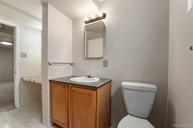 2672 S Magnolia St, Denver, CO 80224 - bathroom with marble look tile flooring and vanity
