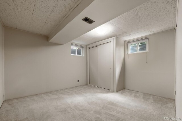 2672 S Magnolia St, Denver, CO 80224 - basement with carpet floors and healthy amount of natural light
