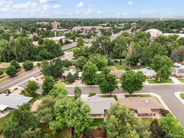 2672 S Magnolia St, Denver, CO 80224 - aerial perspective of suburban area with a tree filled landscape