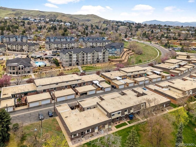 drone / aerial view featuring a mountain view and a residential view