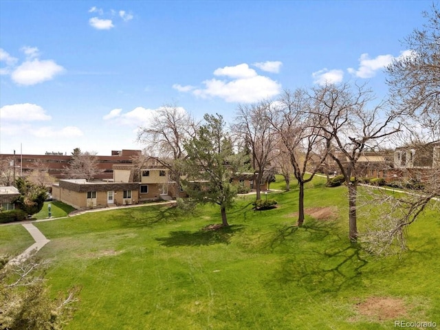 surrounding community featuring a lawn
