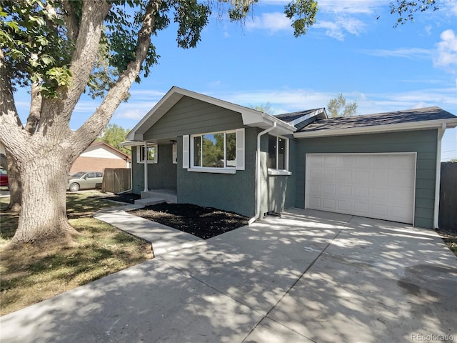 ranch-style home with a garage