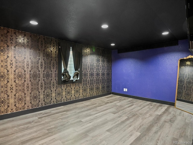 6943 Oak Way, Arvada, CO 80004 - spare room with wood finished floors and recessed lighting