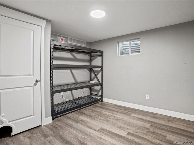 6943 Oak Way, Arvada, CO 80004 - unfurnished bedroom with wood finished floors